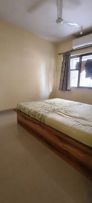 Bedroom in 3 BHK Apartment at K Raheja Palm Spring, Malad West – for Rent