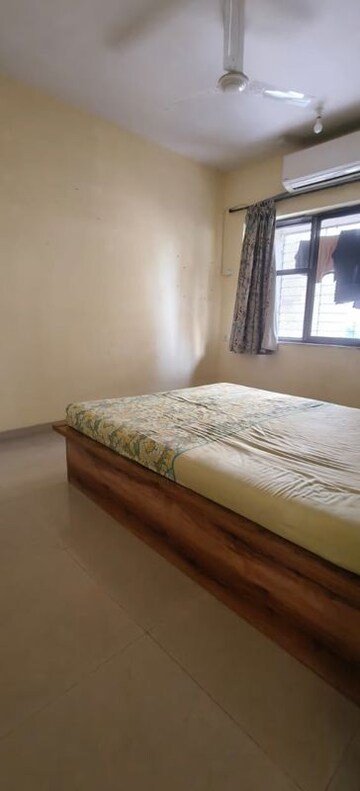 Bedroom in 3 BHK Apartment at K Raheja Palm Spring, Malad West – for Rent