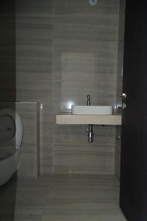 Bathroom in 4 BHK Apartment at Oberoi Realty Esquire, Goregaon East – for Rent
