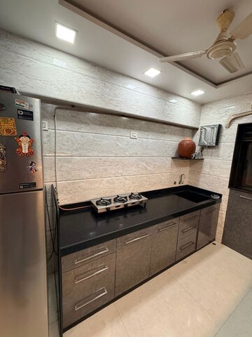 Kitchen in 2 BHK Apartment at Shri Sai Ganesh CHS, Goregaon West – for Rent