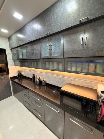 Kitchen in 2 BHK Apartment at Shri Sai Ganesh CHS, Goregaon West – for Rent