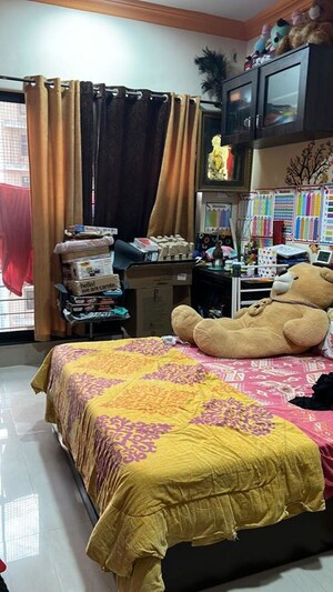 Bedroom in 2 BHK Apartment at K Raheja Heights, Malad East – for Rent