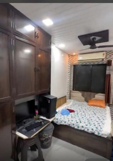 Master Bedroom in 1 BHK Apartment at Ajinkyatara CHS, Thane West – for Sale