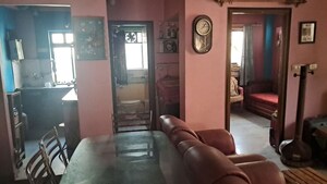 Living Room in 2 BHK Apartment at Lake Market – for Sale