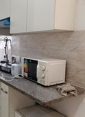 Kitchen in 1 BHK Apartment at Ajnara Elements, Sector 137 – for Rent