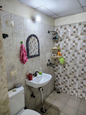 Attached Bathroom in 2 BHK Apartment at Antriksh Golf View, Sector 78 – for Rent