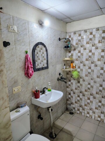 Attached Bathroom in 2 BHK Apartment at Antriksh Golf View, Sector 78 – for Rent