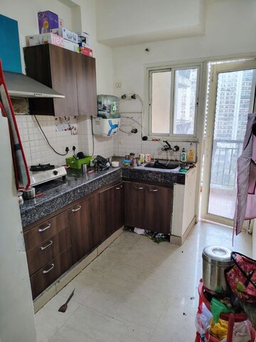 Kitchen in 2 BHK Apartment at Antriksh Golf View, Sector 78 – for Rent