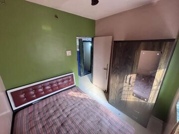 Bedroom in 1 BHK Apartment at Metropolis Bayside, Kasarvadavali – for Rent