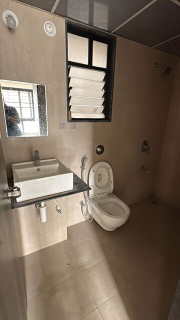 Bathroom in 2 BHK Apartment at Kohinoor Coral Phase 3, Hinjewadi – for Rent