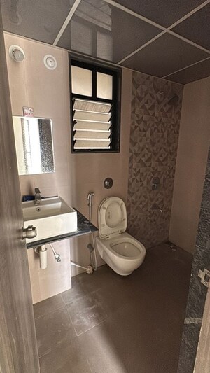 Bathroom in 2 BHK Apartment at Kohinoor Coral Phase 3, Hinjewadi – for Rent