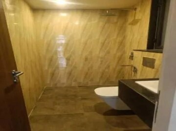 Bathroom in 2 BHK Apartment at Kalpataru Sunrise Grande, Kolshet Road – for Rent