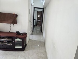 Living Room in 1 BHK Apartment at Lodha Amara, Kolshet Road – for Sale