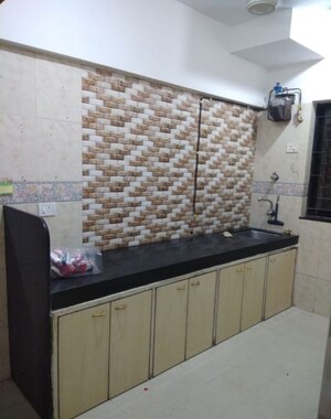 Kitchen in 1 BHK Apartment at K Raheja Palm Spring, Malad West – for Sale