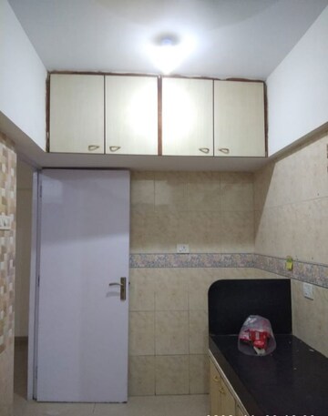 Kitchen in 1 BHK Apartment at K Raheja Palm Spring, Malad West – for Sale