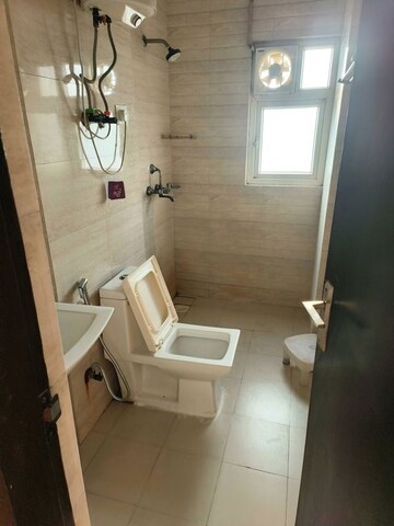 Bathroom in 1 BHK Apartment at Ajnara Daffodil, Sector 137 – for Rent