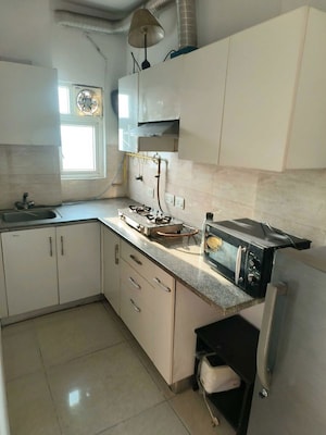 Kitchen in 1 BHK Apartment at Ajnara Daffodil, Sector 137 – for Rent