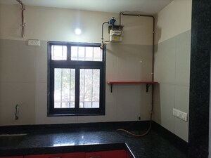 Kitchen in 1 BHK Apartment at Dosti Desire Joy, Brahmand – for Sale
