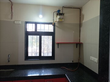 Kitchen in 1 BHK Apartment at Dosti Desire Joy, Brahmand – for Sale