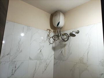 Bathroom in 1 BHK Apartment at Dosti Desire Joy, Brahmand – for Sale