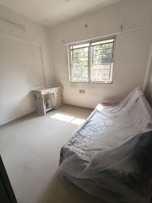 Living Room in 2 BHK Apartment at Laxmi Krupa Apartments, Bhusari Colony – for Rent