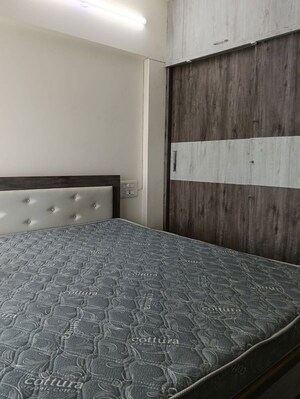 Bedroom in 2 BHK Apartment at Paranjape Azure, Tathawade – for Rent