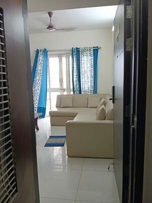 Living Room in 2 BHK Apartment at Paranjape Azure, Tathawade – for Rent