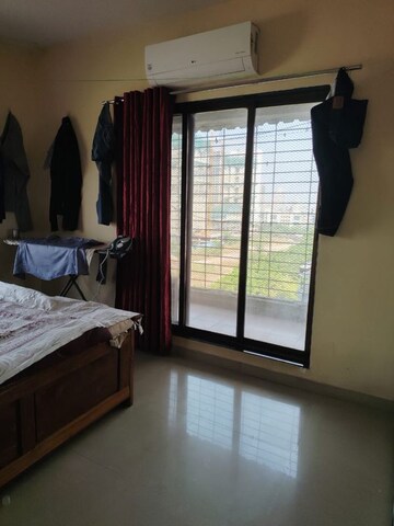 Bedroom in 2 BHK Apartment at Shree Sawan Lifestyle, Kharghar Sector 15 – for Rent