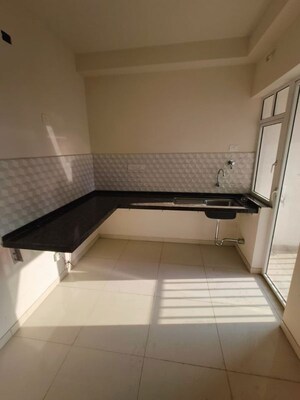 Kitchen in 2 BHK Apartment at Godrej Green Cove, Mahalunge – for Rent