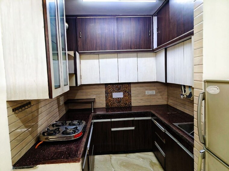 Kitchen, om-tower 1 Bedroom 316 Sq.Ft. Apartment In Dlf City Phase 3 Gurgaon 9996011