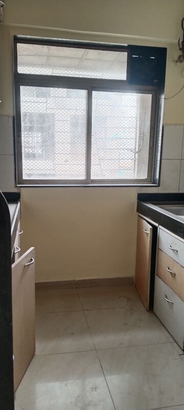 Kitchen in 2 BHK Apartment at Nirmal Lifestyle Residency CHS Ltd, Mulund West – for Rent
