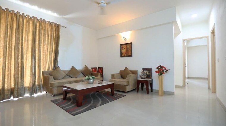Living Room, wave-dream-homes 2 Bedroom 840 Sq.Ft. Apartment In Wave City Ghaziabad 9995725