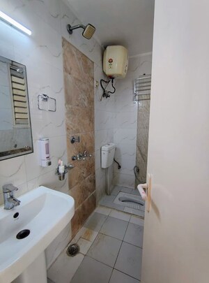 Bathroom in 4 BHK Apartment at Sector 10 Dwarka – for Rent