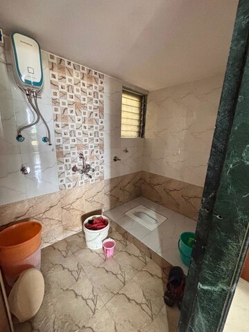 Bathroom in 2 BHK Apartment at Shankar Complex, Kalyan East – for Sale