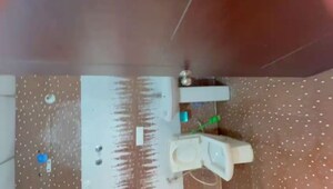 Bathroom in 2 BHK Apartment at Landcraft Golf Links, Pandav Nagar – for Sale