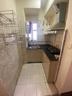 Kitchen in 1 BHK Apartment at Paras Tierea, Sector 137 – for Sale