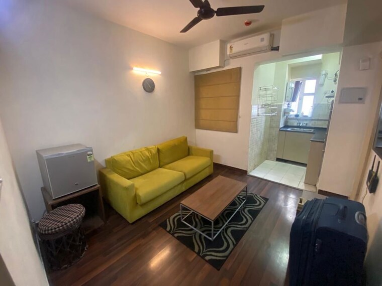 Living Room, paras-tierea 1 Bedroom 450 Sq.Ft. Apartment In Sector 137 Noida 9996234