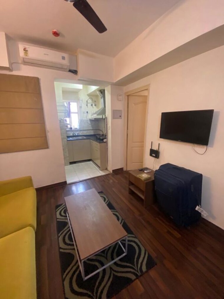 Living Room, paras-tierea 1 Bedroom 450 Sq.Ft. Apartment In Sector 137 Noida 9996234