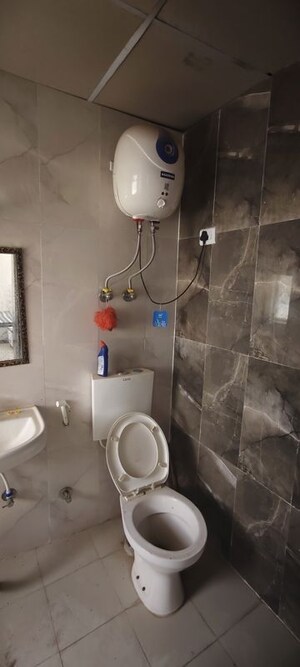 Bathroom in 2 BHK Apartment at Pivotal Riddhi Siddhi, Sector 99 – for Rent