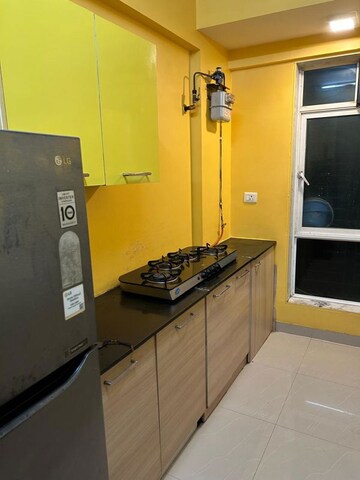 Kitchen in 2 BHK Apartment at Dedhia Palatial Height, Powai – for Rent