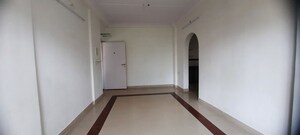 Living Room in 2 BHK Apartment at New Mhada Towers, Andheri West – for Sale