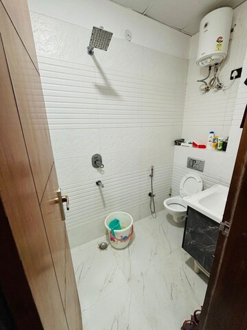 Bathroom in 3 BHK Builder Floor at Vasundhara Sector 1 – for Sale