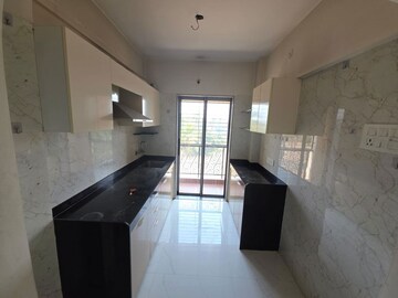 Kitchen in 2 BHK Apartment at Shrehit Emerald Woods, Kurgaon – for Sale