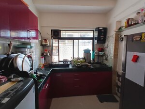 Kitchen in 1 BHK Apartment at RNA NG Regency Phase I, Balkum Pada – for Sale