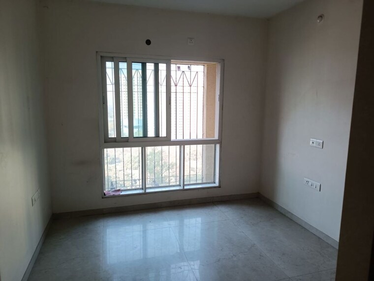 Room, dosti-west-county 1.5 Bedroom 545 Sq.Ft. Apartment In Balkum Pada Thane 9995848