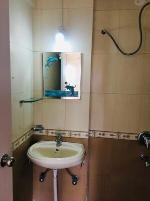 Bathroom in 2 BHK Apartment at Paranjape Schemes Yuthika, Baner – for Rent