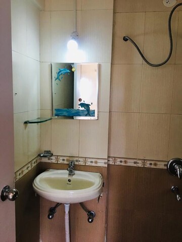 Bathroom in 2 BHK Apartment at Paranjape Schemes Yuthika, Baner – for Rent