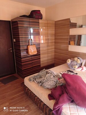 Bedroom in 2 BHK Apartment at Paranjape Schemes Yuthika, Baner – for Rent