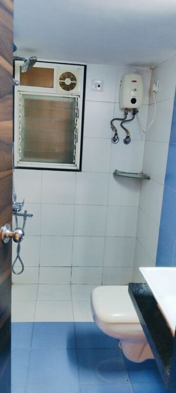 Bathroom in 2 BHK Apartment at Satellite Garden, Goregaon East – for Sale