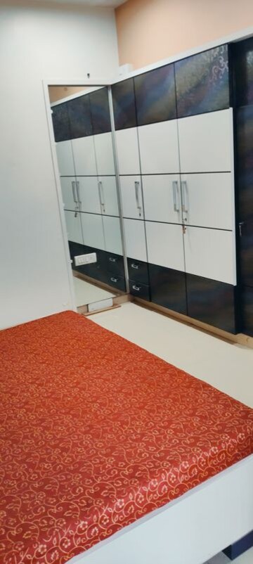 Master Bedroom in 2 BHK Apartment at Satellite Garden, Goregaon East – for Sale